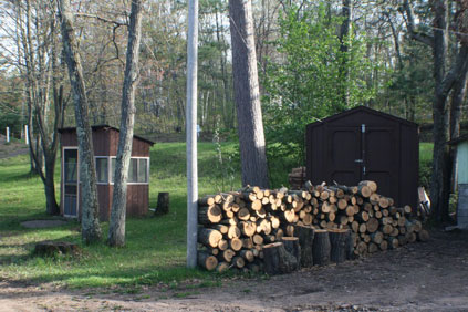 Firewood and fish cleaning house